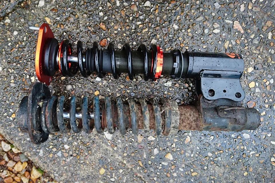 Old suspension and new suspension, side by side