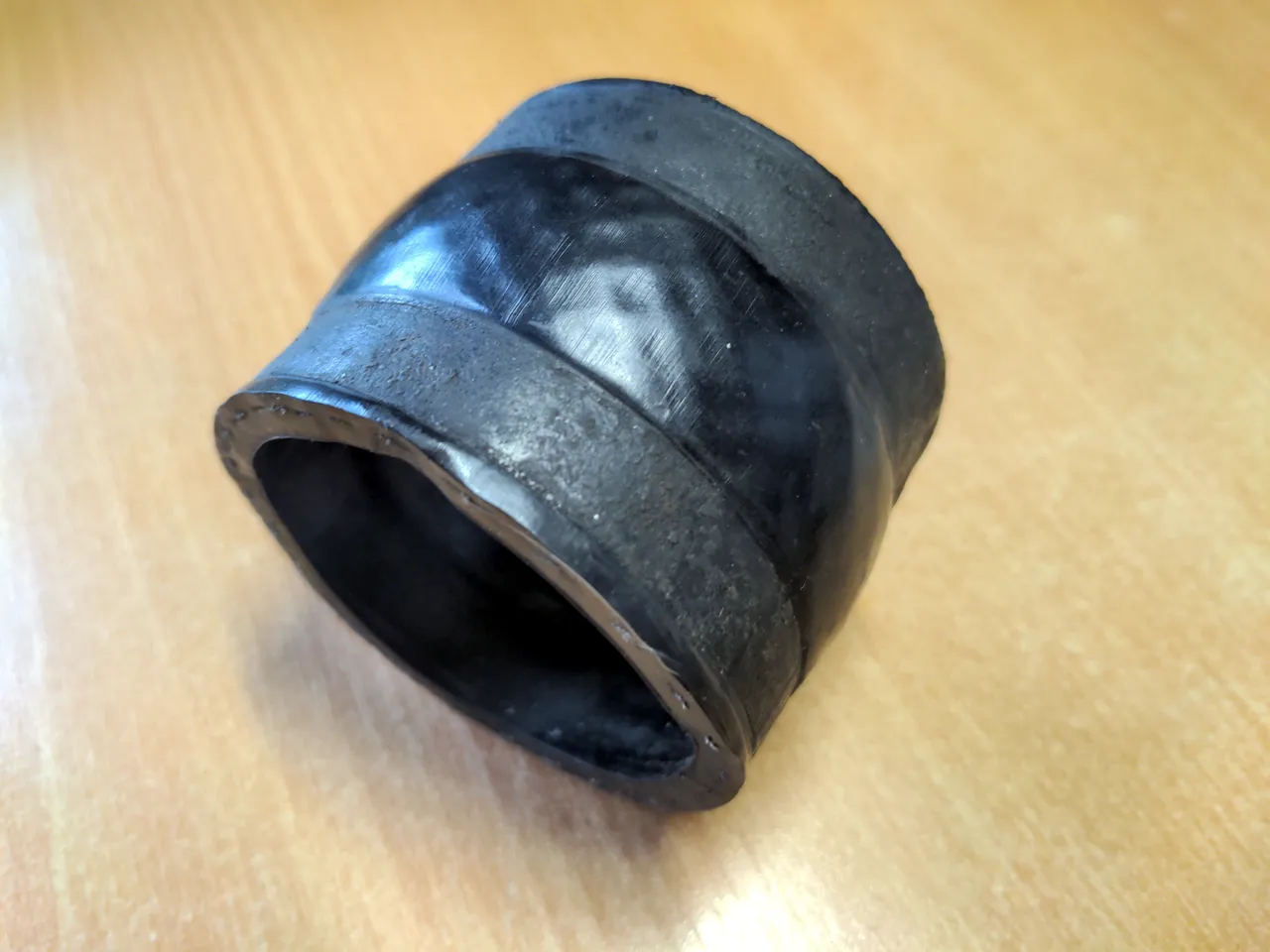 An old, though completely-usable, coupling hose. It is about 60mm in diameter and about as long.