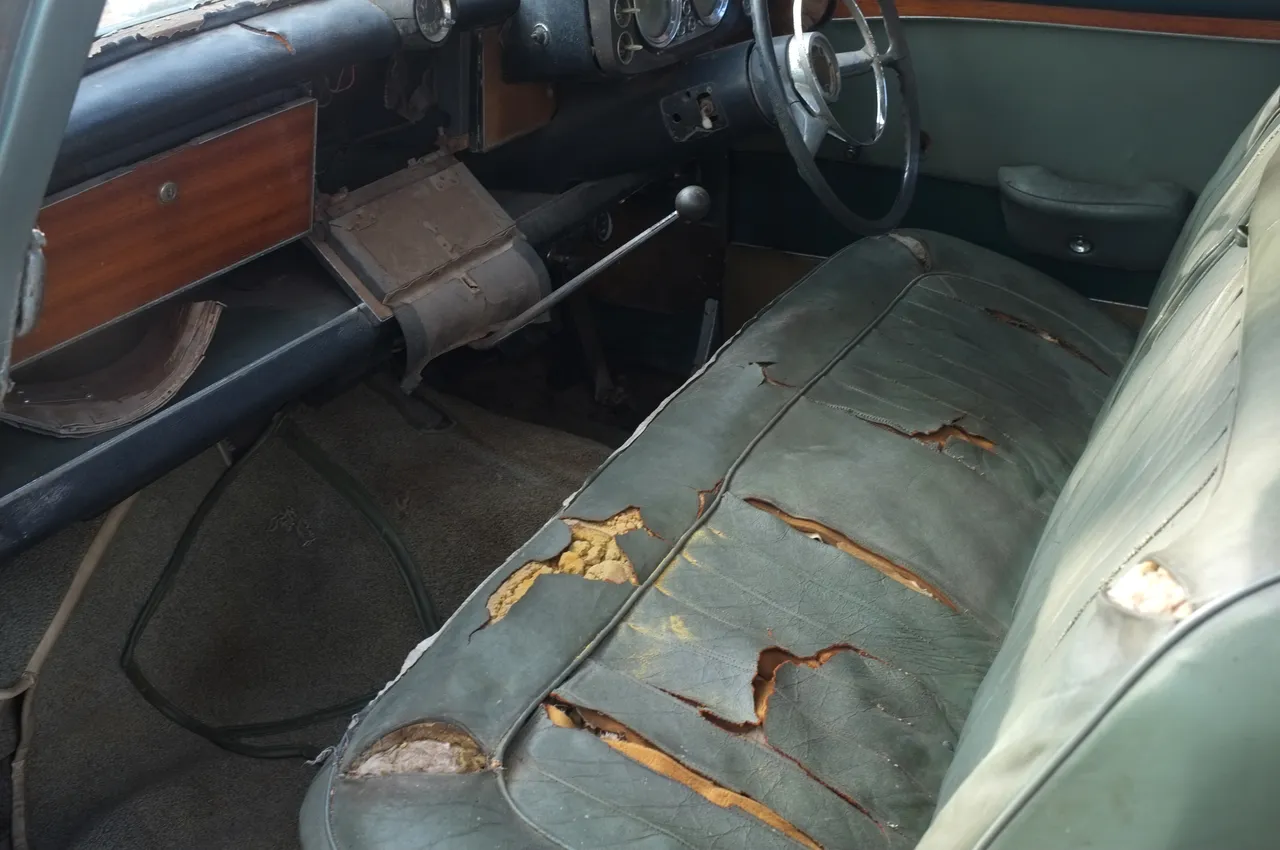A completely shot interior from a 1964 Rover P5