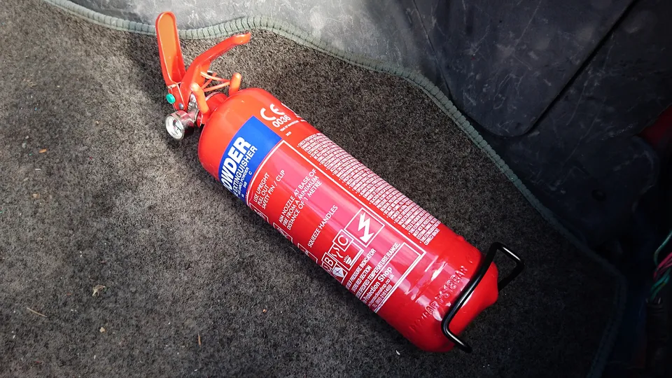 Fire extinguisher fitted in the boot