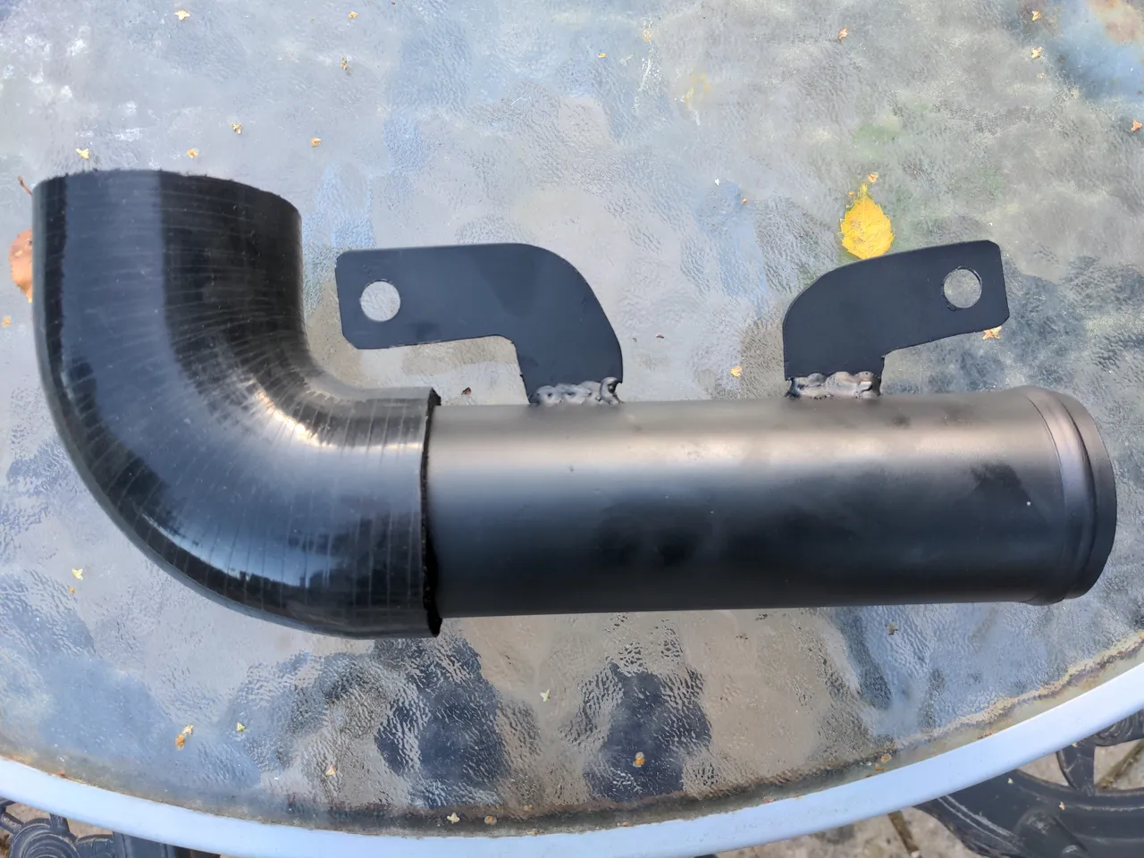 The intake pipe with its 90 degree silicone bendy bit.