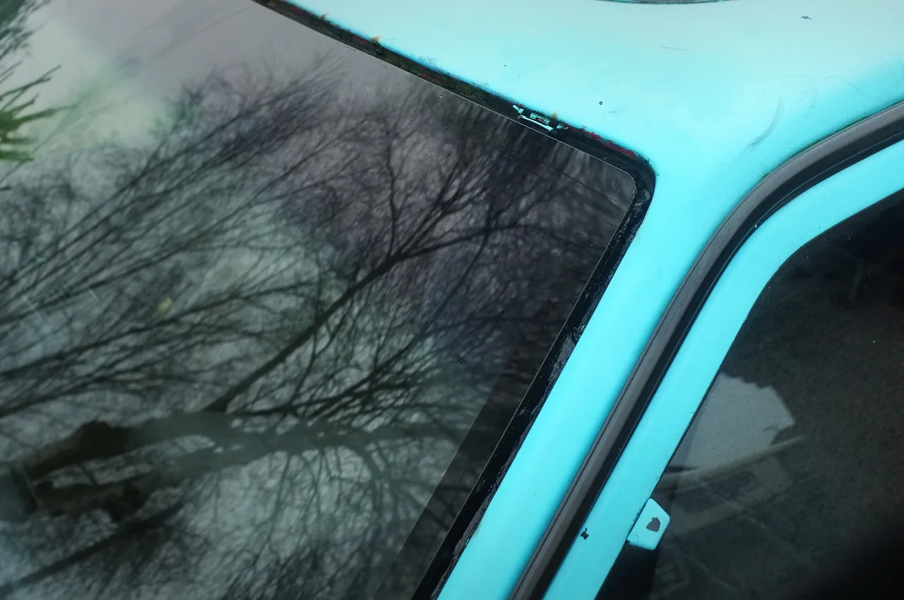 New Mazda 323 BF windscreen, with blue tint