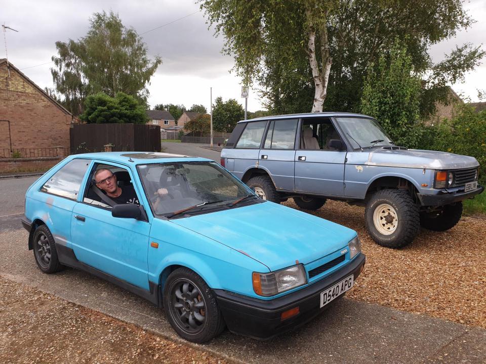 Me in the Mazda, in front of Alex's 1987 Range Rover.