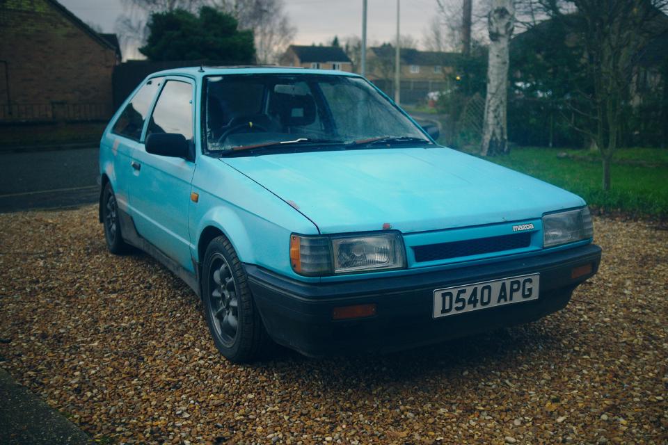 My Mazda 323 GTX, sitting pretty.