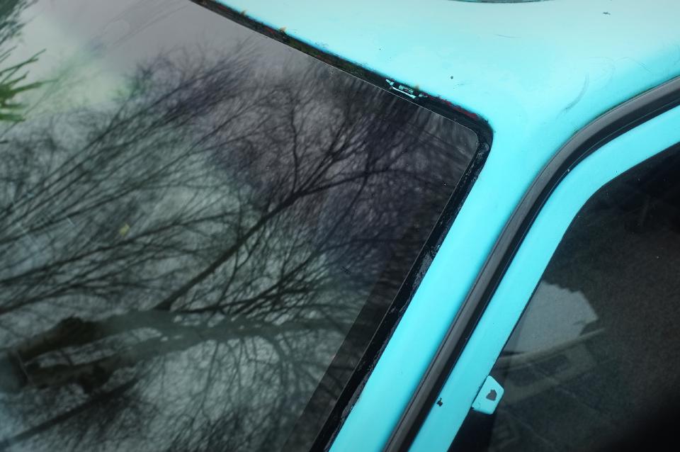 New Mazda 323 BF windscreen, with blue tint