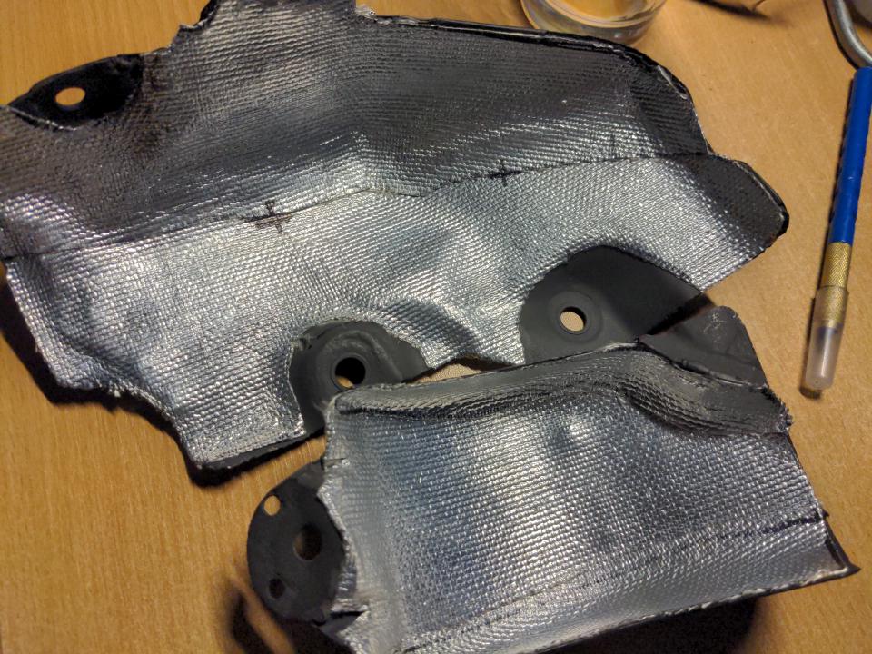 The inner lining of my heat shield completed. It is covered in a silver reflective material.