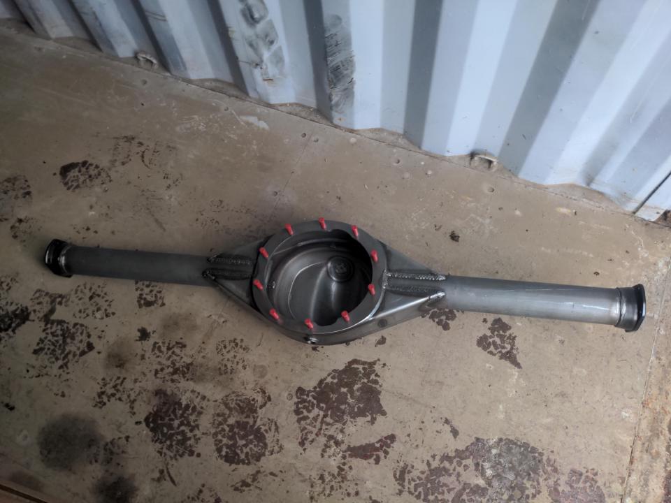 A Ford 9 inch axle housing.