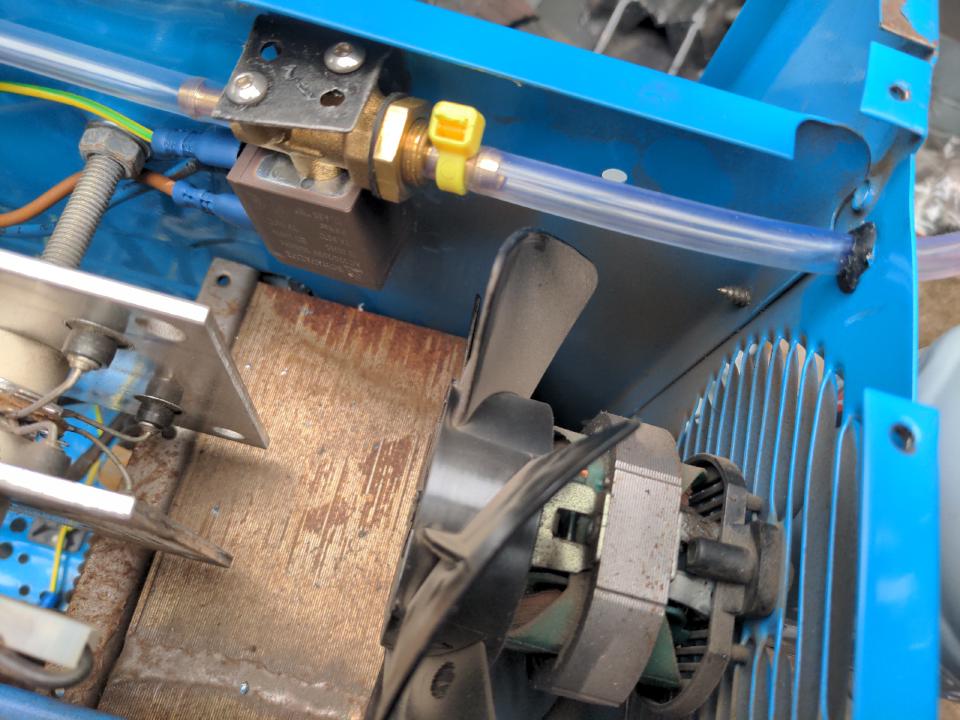 My gas feed hose is about a centimeter from the cooling fan on the inside of the welder.