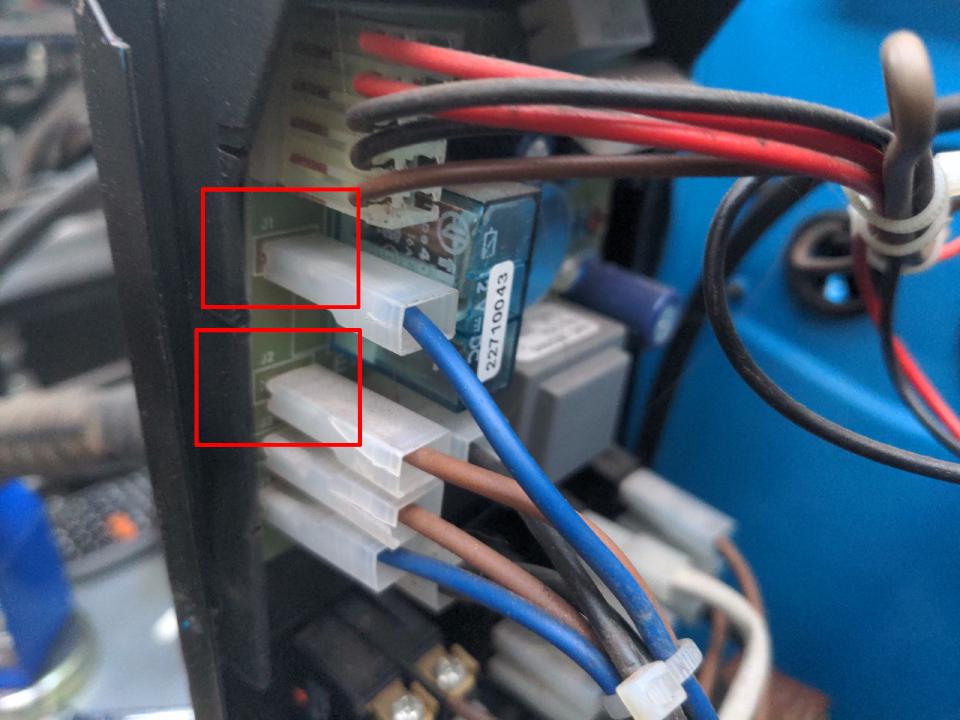 The main board of my welder, with the J1 and J2 connectors indicated.
