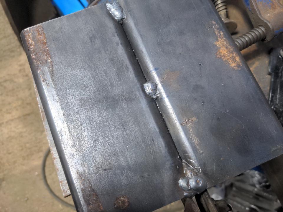 Two 160mm long lengths of the aforementioned pieces of box section steel, welded together with three MIG welds, each of those welds being about an inch long, welded to each other.