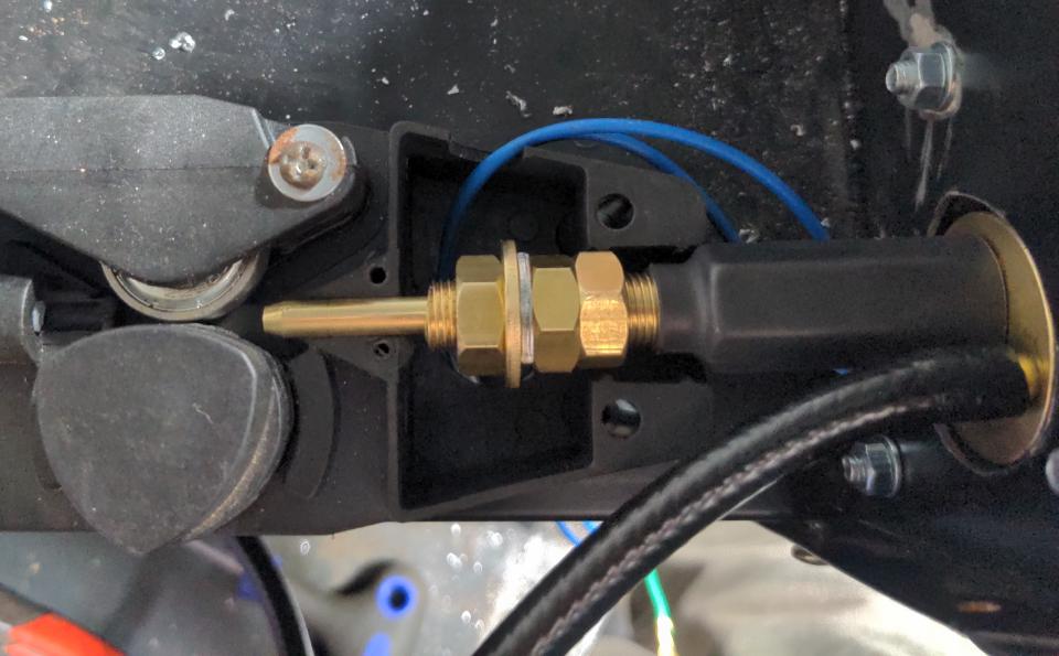 A Euro torch plug body fitted into the top of the welder.