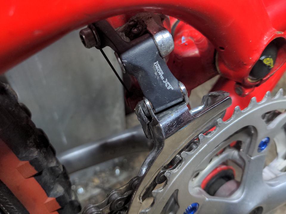 The front mech fitted to the bike; it is also Shimano XT from the 1990s, in the same style as the rear mech.