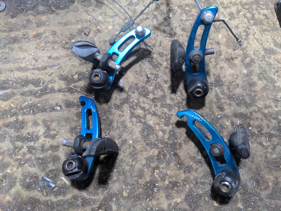 Blue anodised Tektro cantilever brakes from the 1990s complete with pads.