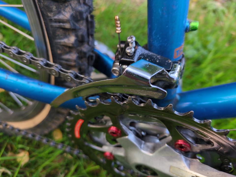 A black Deore LX front mech.