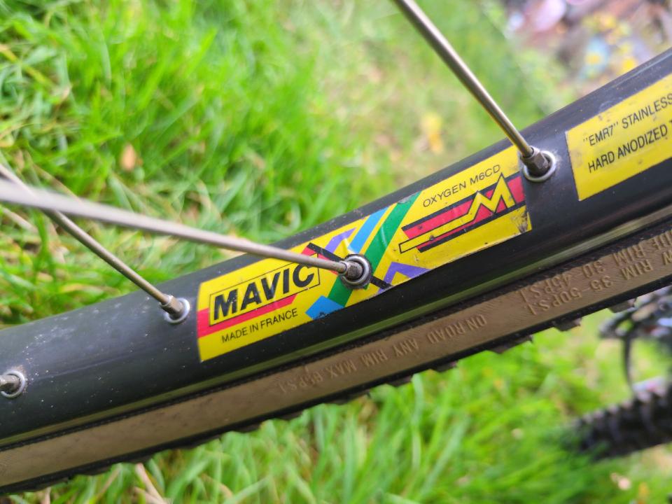 Closeup of the yellow stickers for my grey Mavic Oxygen rims.