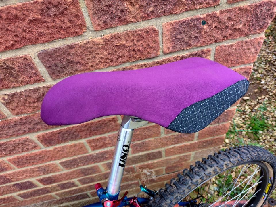 A large Setlaz downhill seat. I have recovered it with purple neoprene and black kevlar mix fabric to protect the corners.