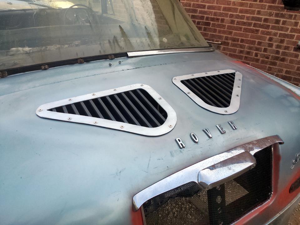 The completed vents bolted into the holes I made for them.