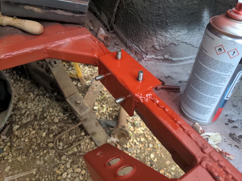 The above welded on to the box section frame, and painted with red oxide primer.