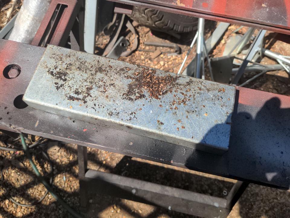 A piece of galvanised steel C-section measuring about 4 inches wide and 1.2mm thick.